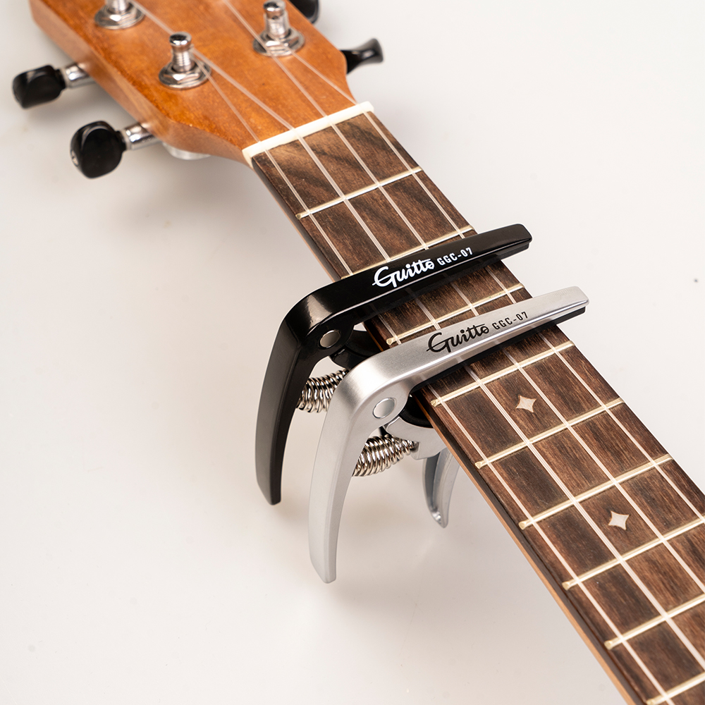 GUITTO GGC-07 Ukulele Capo Qui - Diy Guitar Electronics ulasan dan harga