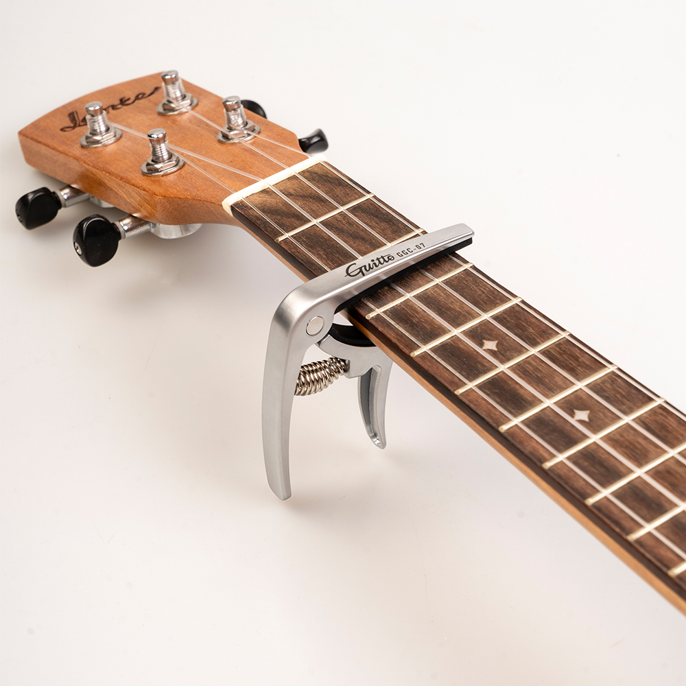 GUITTO GGC-07 Ukulele Capo Qui - Diy Guitar Electronics ulasan dan harga